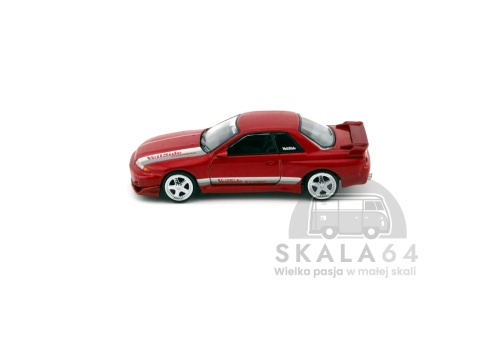 Model samochodu Nissan Skyline GT-R R32 VeilSide Combat C-I Gem Red w skali 1:64 - bok