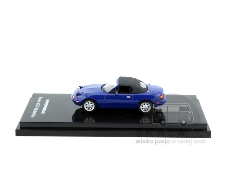 Model samochodu Mazda MX-5 Miata NA Spider Roadster LHD Laguna Blue w skali 1:64 - bok