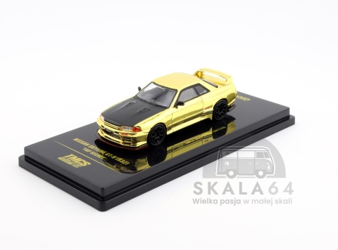 Model samochodu Nissan Skyline GT-R R32 Top Secret Chrome Gold TMCS2025 Event Edition w skali 1:64 - przód