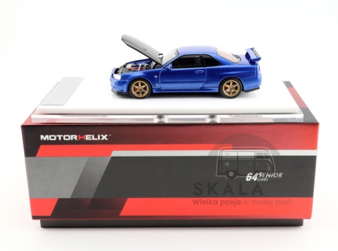 Model samochodu Nissan Skyline GT-R R34 V-Spec II Bayside Blue w/ Carbon Fiber Bonnect w skali 1:64 M63450 - opakowanie