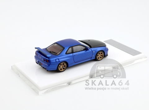 Model samochodu Nissan Skyline GT-R R34 V-Spec II Bayside Blue w/ Carbon Fiber Bonnect w skali 1:64 M63450 - tył